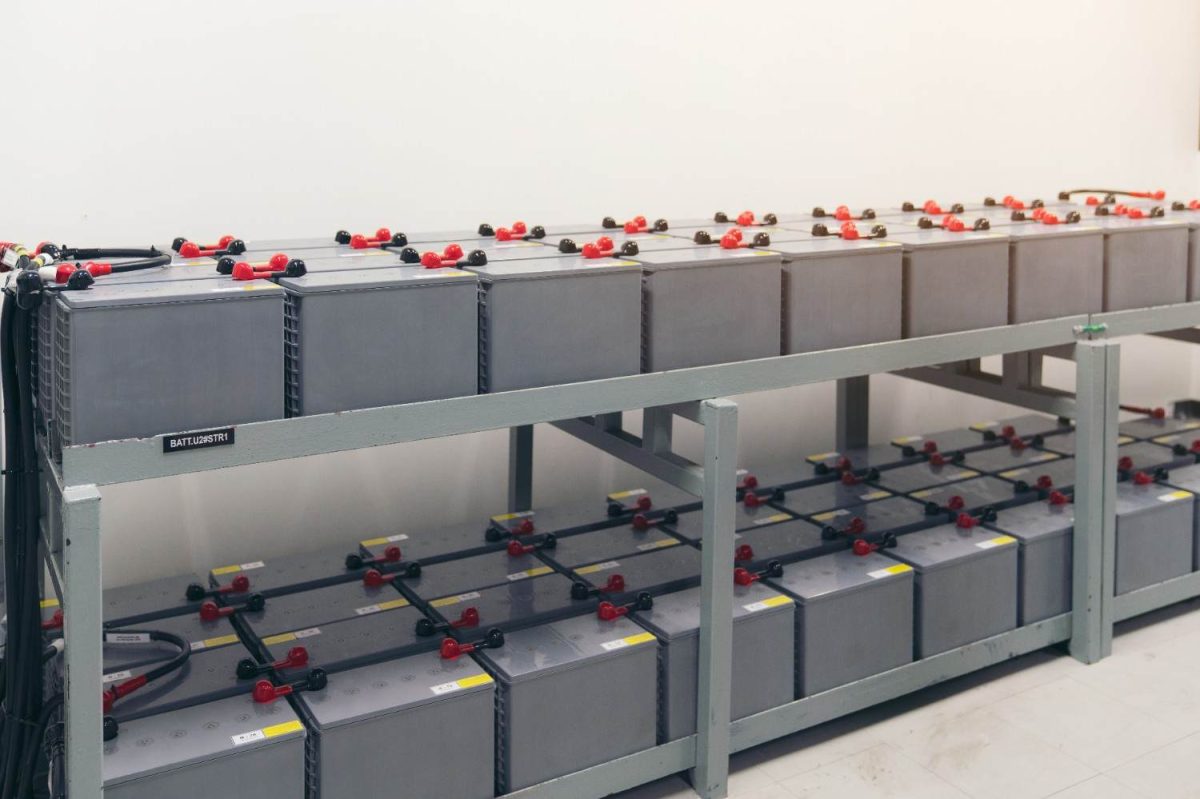 Rows of Batteries on Metal Shelving